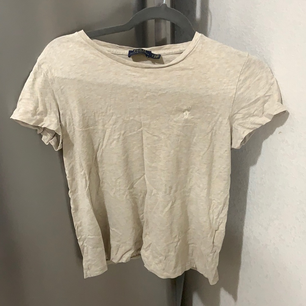 Ralph Lauren polo size small in the color cream